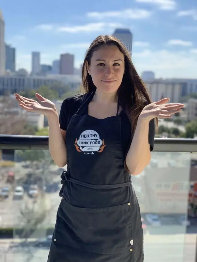 Julia Goolia in a Hellthy Junk Food apron